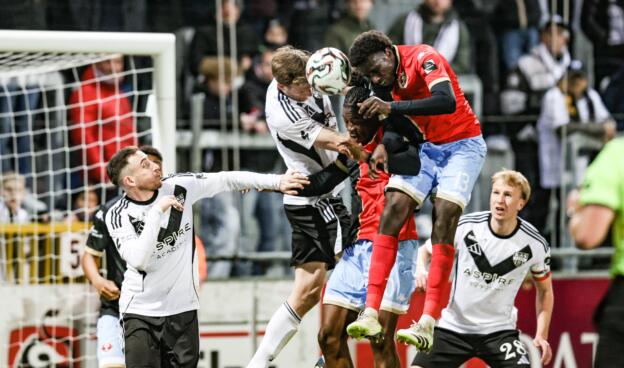 Eupen's Scott Kennedy, Seraing's Hemsley Chizorba Akpa-Chukwu and Seraing's Hady Camara fight for the ball during a soccer game between KAS Eupen and RFC Seraing, Friday 20 March 2026 in Eupen, on day 31 of the 2025-2026 'Challenger Pro League' 1B second division of the Belgian championship. BELGA PHOTO BRUNO FAHY