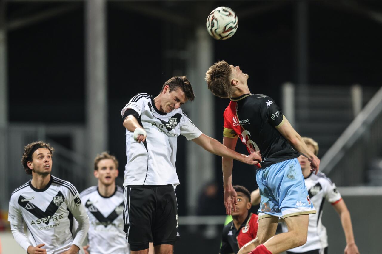 Eupen's Yentl Van Genechten and Seraing's Noah Solheid fight for the ball during a soccer game between KAS Eupen and RFC Seraing, Friday 20 March 2026 in Eupen, on day 31 of the 2025-2026 'Challenger Pro League' 1B second division of the Belgian championship. BELGA PHOTO BRUNO FAHY